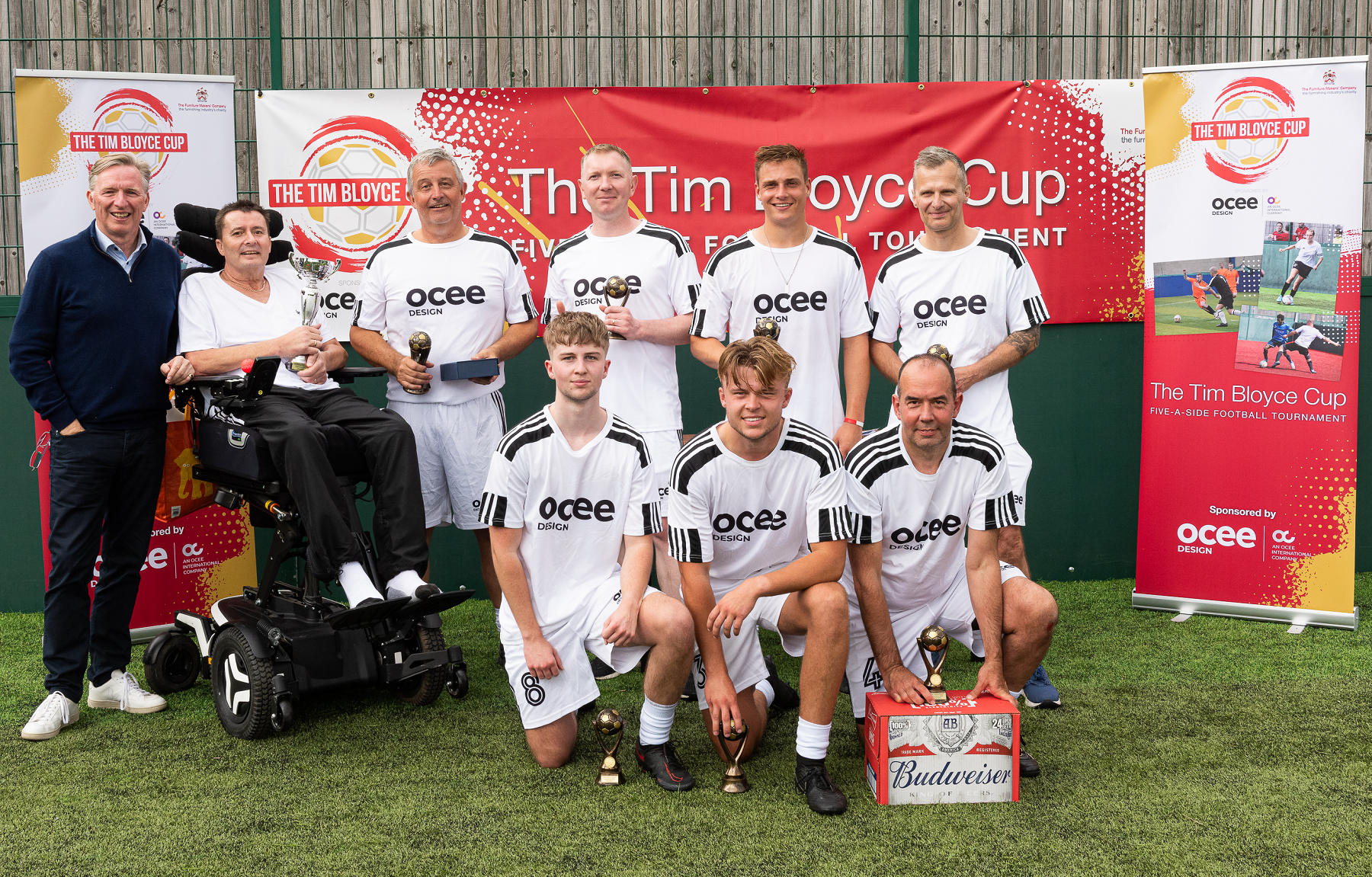 Alistair Gough, CEO of Ocee Design_ Tim Bloyce and the winning team, Ocee United